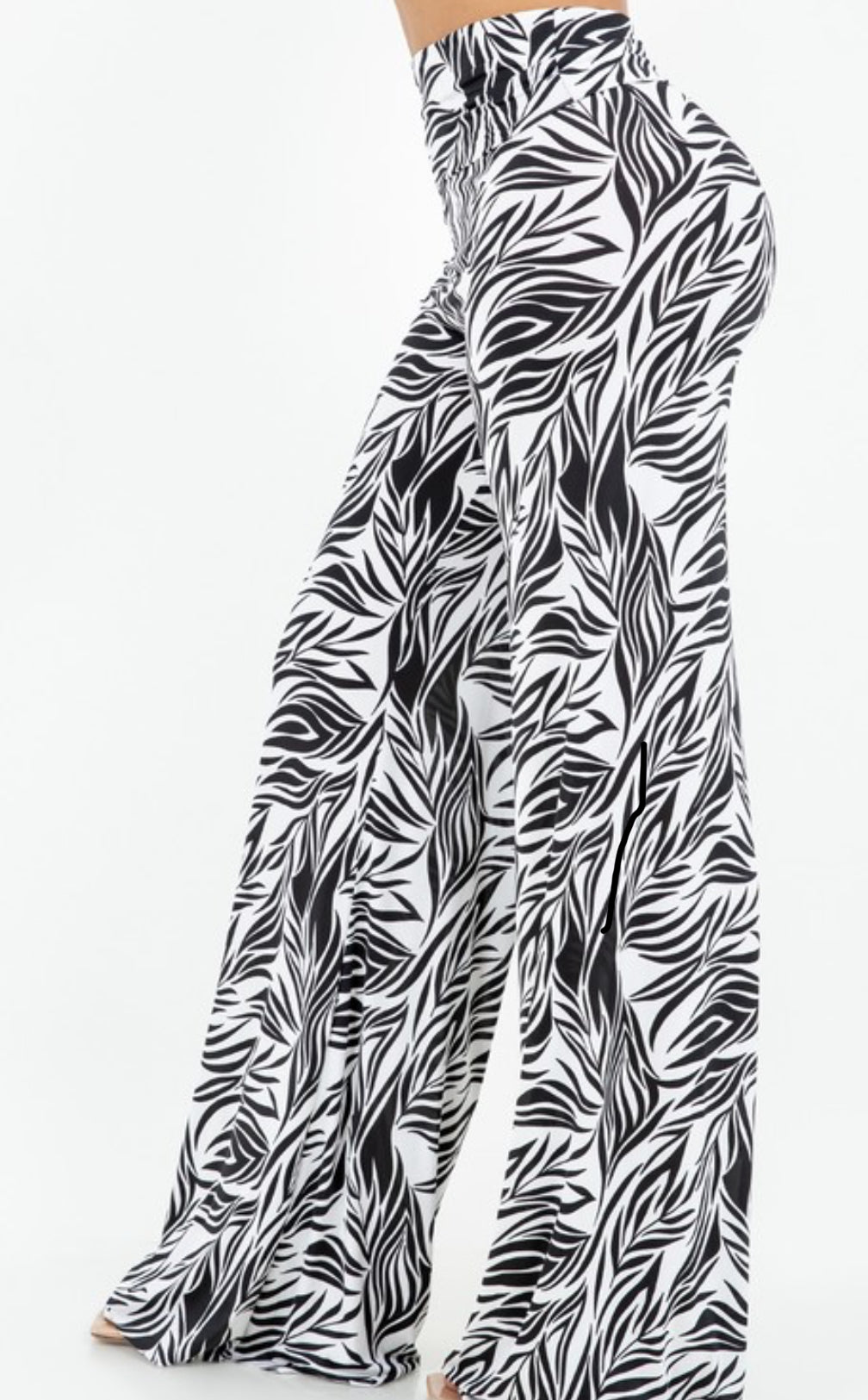 Black and white patterned wide-leg pants on a white background