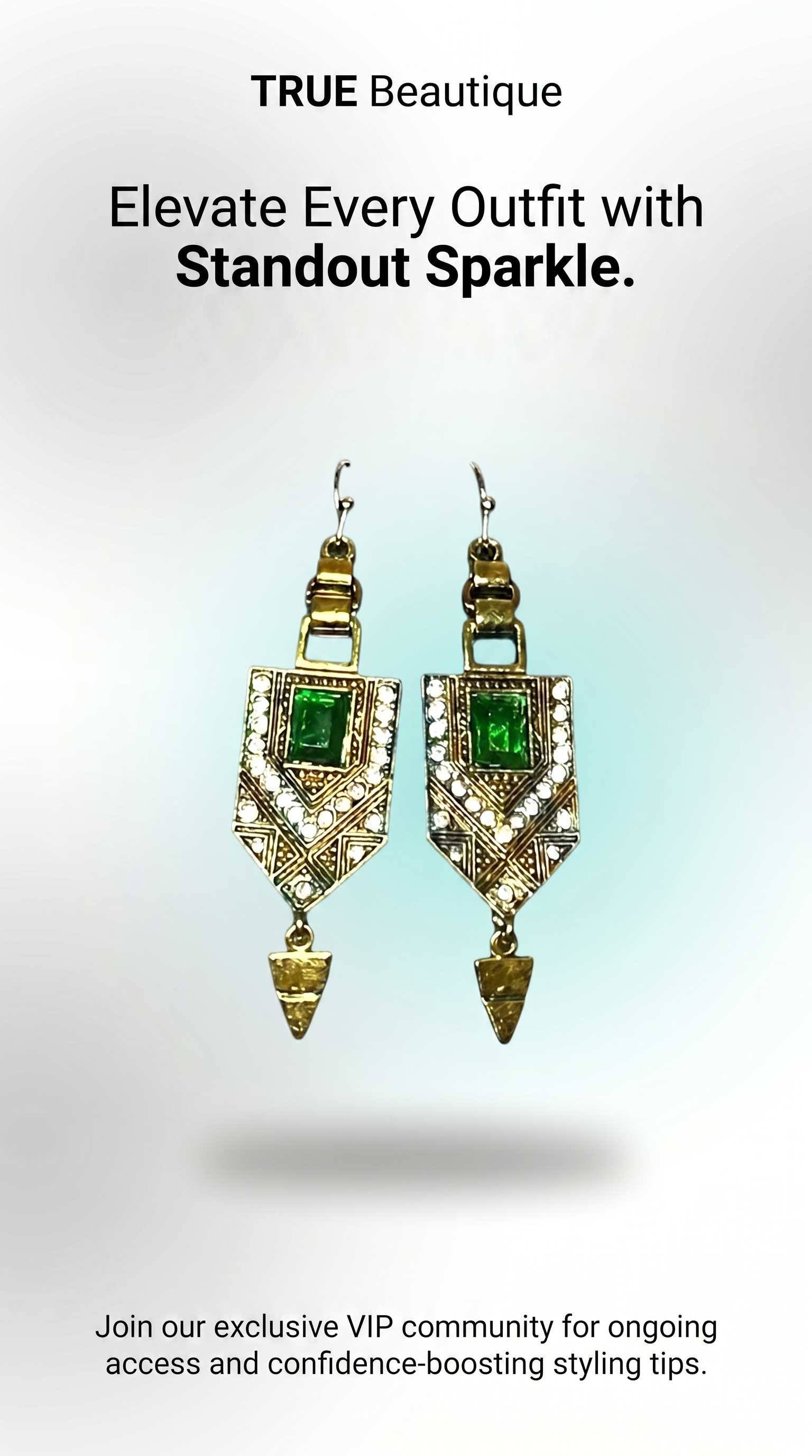 A pair of gold-toned statement dangle earrings with green rectangular stones and clear rhinestone-like accents, shown against a light gray gradient background with promotional text above and below.
